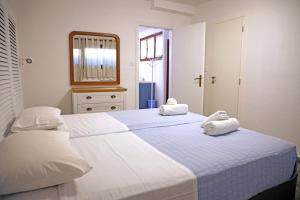 Postel nebo postele na pokoji v ubytování The 4 Travellers Halkidiki