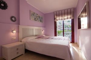 Кровать или кровати в номере Apartamento Los Balandros