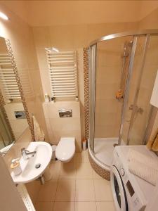 Kúpeľňa v ubytovaní Apartament z Antresolą Kraków Kazimierz Bożego Ciała