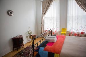 a bedroom with a bed and a window at Object Hotel 1BR Shared Bath Room 2C in Bisbee