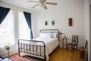 a bedroom with a bed and a ceiling fan at Object Hotel 1BR Room 3A in Bisbee
