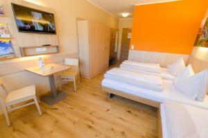 Postel nebo postele na pokoji v ubytování JUFA Hotel Neutal