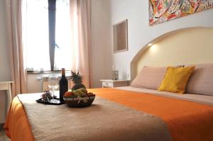 Posteľ alebo postele v izbe v ubytovaní B&B Rosa dei Venti