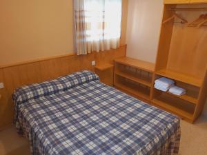 Ένα ή περισσότερα κρεβάτια σε δωμάτιο στο Apartamentos la Francesa