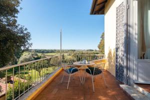 A balcony or terrace at IV Casale Roma Country Villa