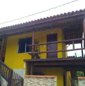 Rõdu või terrass majutusasutuses Suites da Dorinha