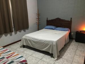 Cama ou camas em um quarto em Regi House Hostel