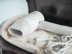 a nintendo wii game controller sitting on a table at Khampare Chiang Mai Hotel in Chiang Mai