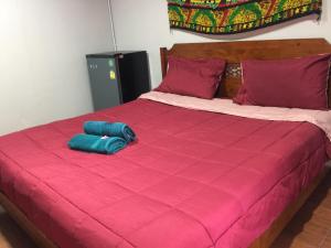 Postel nebo postele na pokoji v ubytování SMILE HOME GUESTHOUSE
