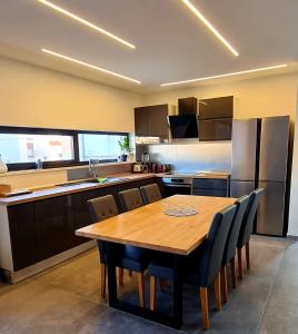 Kuchyň nebo kuchyňský kout v ubytování SPA Apartment Vito