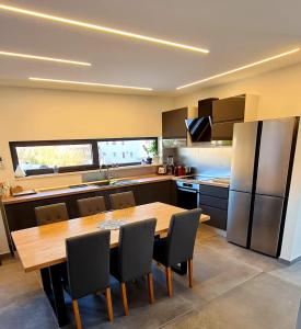 Kuchyň nebo kuchyňský kout v ubytování SPA Apartment Vito
