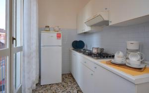 Kuchyň nebo kuchyňský kout v ubytování Appartamenti Dal Moro