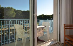 Balkón nebo terasa v ubytování Appartamenti Dal Moro