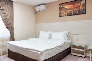 Katil atau katil-katil dalam bilik di Musafir Hotel