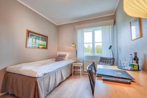 Letto o letti in una camera di Hooks Herrgård
