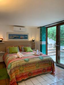 Ένα ή περισσότερα κρεβάτια σε δωμάτιο στο Relais Serapo