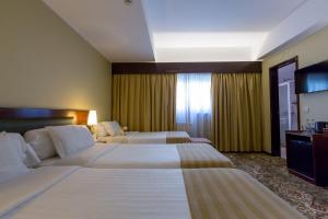 Postel nebo postele na pokoji v ubytování Hotel Sao Jose