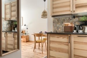 Kuchyňa alebo kuchynka v ubytovaní Kościelisko Apartament Przy Dolince + 13 fotografií