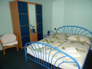 Postel nebo postele na pokoji v ubytování Penzion Paradise