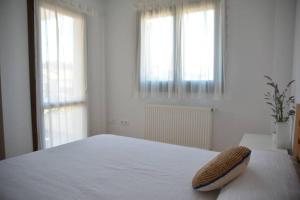 Ein Bett oder Betten in einem Zimmer der Unterkunft Casa Miruetxe