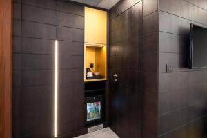 Телевізор і / або розважальний центр в Time Boutique Hotel