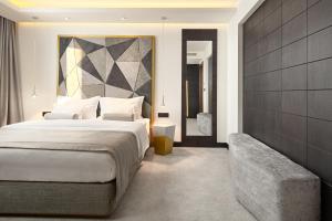 Ліжко або ліжка в номері Time Boutique Hotel