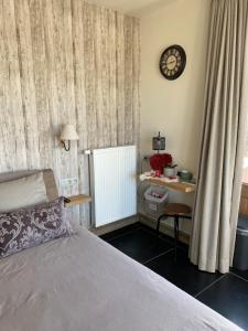 Postel nebo postele na pokoji v ubytování B&B 't Hoveke + 12 fotografií