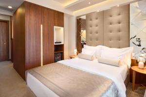 Ліжко або ліжка в номері Time Boutique Hotel