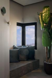 Un lugar para sentarse en Apikia Santorini