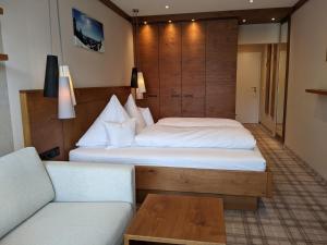 Postel nebo postele na pokoji v ubytování Hotel Germania