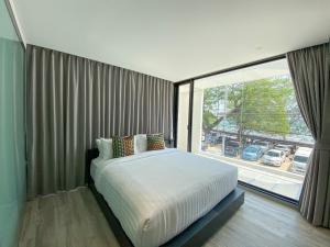 Postel nebo postele na pokoji v ubytování Nirundorn Resort Chaam + 37 fotografií