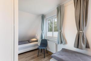 Llit o llits en una habitació de Haus Hein Mück