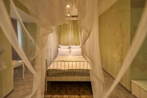 Tempat tidur dalam kamar di Hotel VILLA de IDALGO