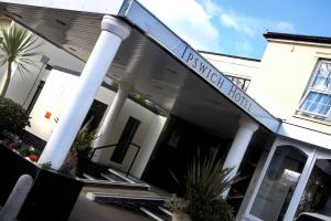 a building with a sign that reads harmony house at Best Western Ipswich Hotel in Ipswich