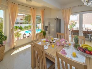 a dining room with a table with fruit on it at Holiday Home Valdor by Interhome in Sovlje