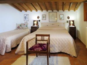 Ένα ή περισσότερα κρεβάτια σε δωμάτιο στο Holiday Home Casolare Ser Chelino by Interhome