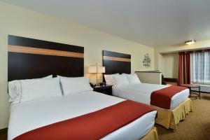 a hotel room with two beds and a window at Holiday Inn Express Portland SE - Clackamas Area, an IHG Hotel in Gladstone