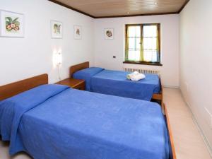 Postel nebo postele na pokoji v ubytování Holiday Home Al Rustico by Interhome + 8 fotografií