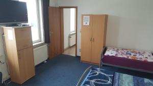 Postel nebo postele na pokoji v ubytování Gästehaus Harly - Monteurzimmer