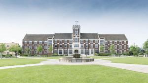 a large building with a fountain in front of it at University Walk in Loughborough