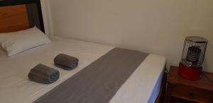 Letto o letti in una camera di Hotel ColdWorld