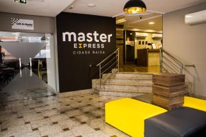a store lobby with amarket express sign on the wall at Master Express Cidade Baixa - Próximo ao Araujo Viana, UFRGS e Santa Casa in Porto Alegre
