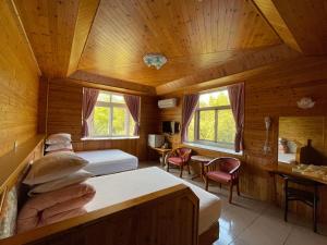 Postel nebo postele na pokoji v ubytování Xi Zhi Tou Homestay