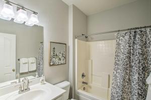 a bathroom with a sink and a shower at Game Room and Pool Spacious Queen Creek Home! in Queen Creek