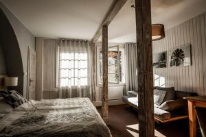 Postel nebo postele na pokoji v ubytování Hotel & Garden U Holubů