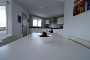 A kitchen or kitchenette at Casa Achaman - Contemporary style villa with outstanding views