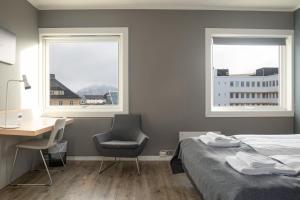 Postel nebo postele na pokoji v ubytování Fast Hotel Svolvær