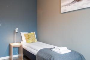 Postel nebo postele na pokoji v ubytování Fast Hotel Svolvær