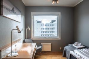 Postel nebo postele na pokoji v ubytování Fast Hotel Svolvær
