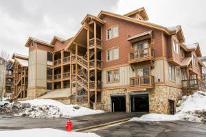 a building with a fire hydrant in front of it at Town Point Condos by Park City Vacations in Park City